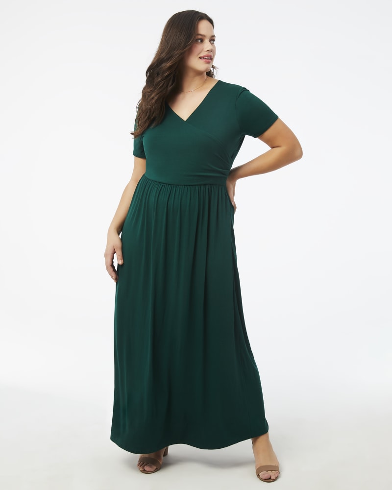 Plus size model with apple body shape wearing Carnation Wrap Maxi Dress by Meri Skye | Dia&Co | dia_product_style_image_id:202542
